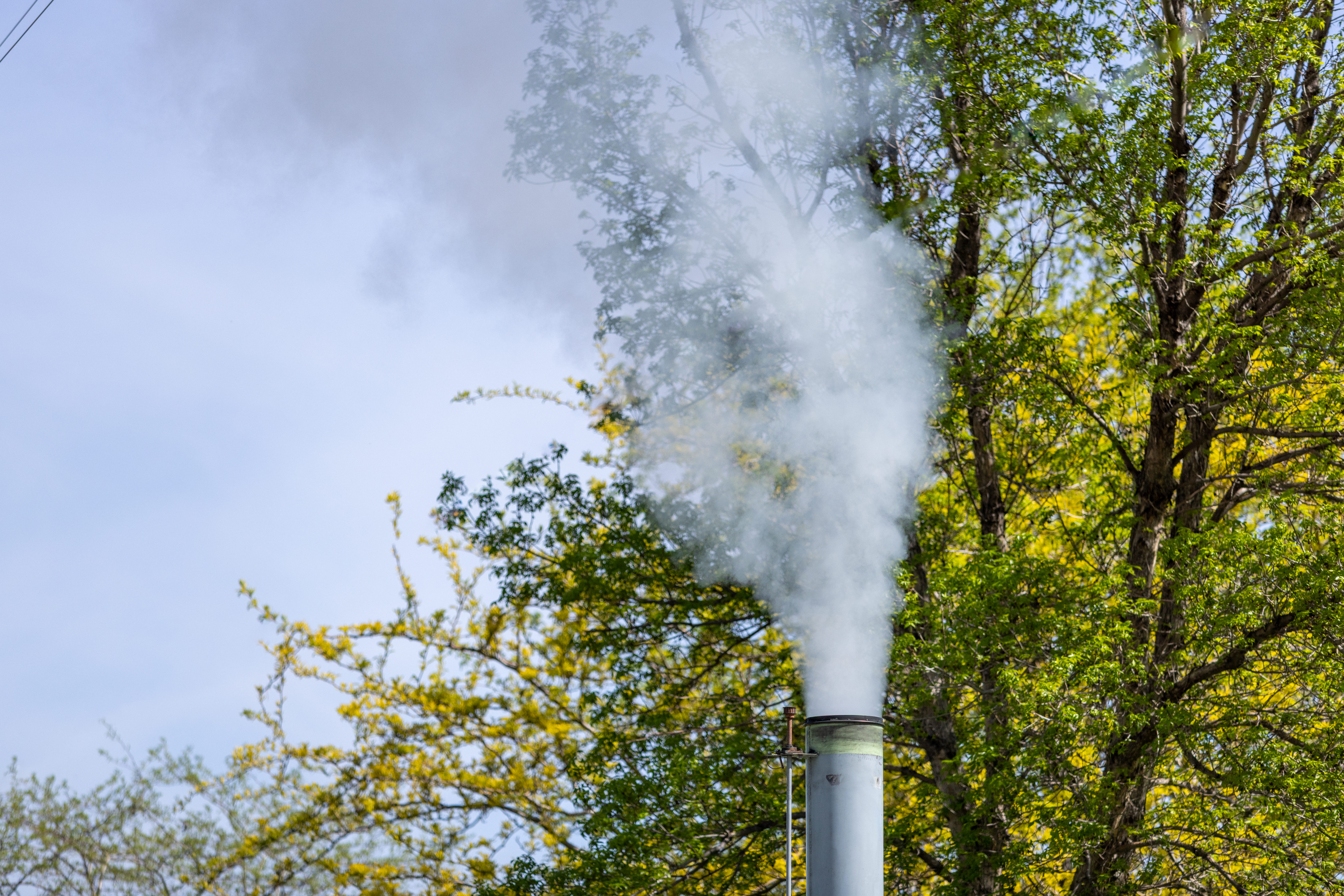 Smoke School field observation with visible emissions from a stack.