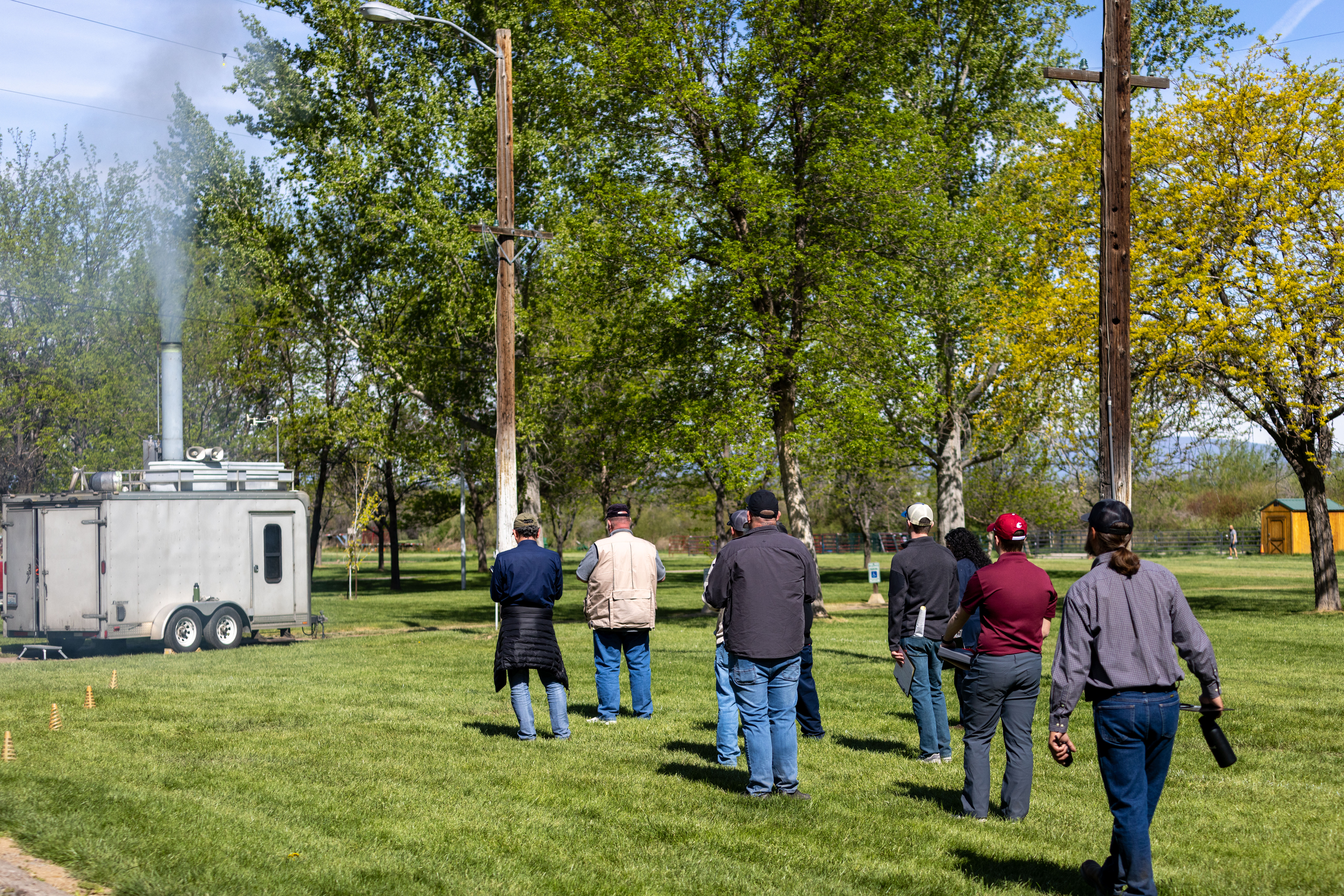Students observing visible emissions during an outdoor Method 9 training event.